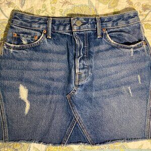 Mini denim GRLFRND skirt with distressed details